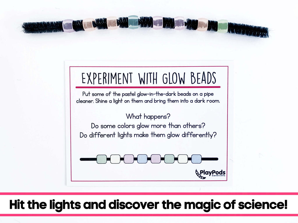 Glow-in-the-dark beads on a black pipe cleaner with activity card
