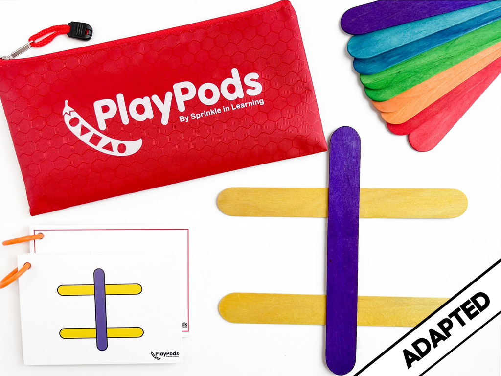 Red PlayPod pouch, colorful sticks and instruction card