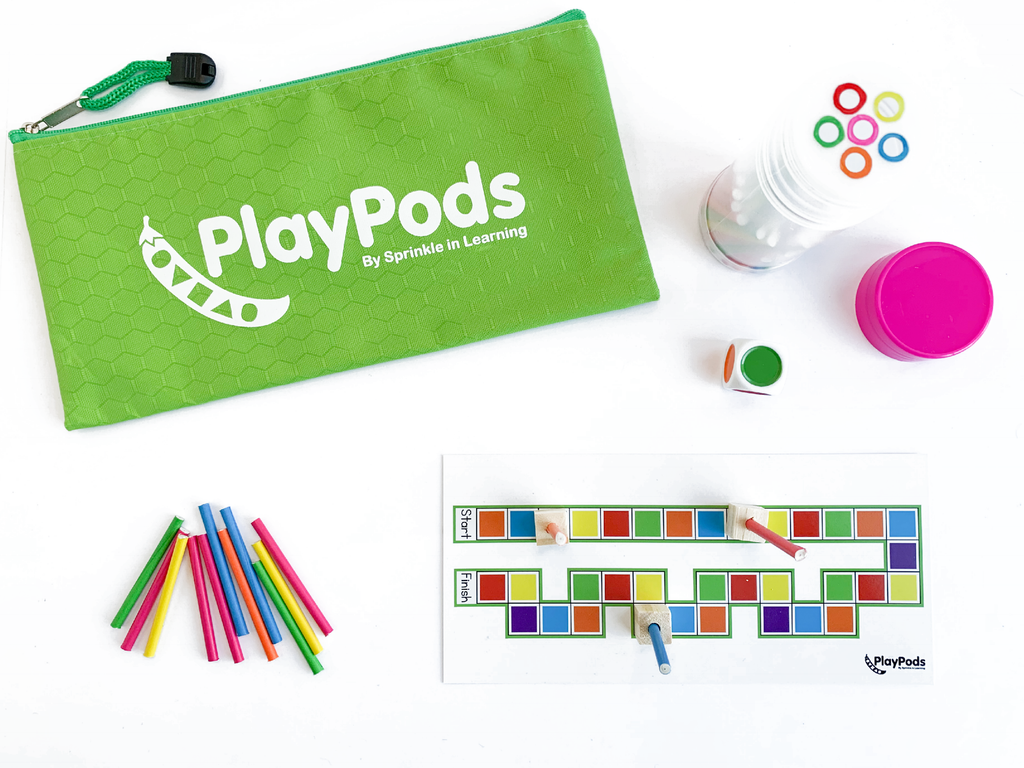Lime green PlayPod pouch, colorful sticks, and game board