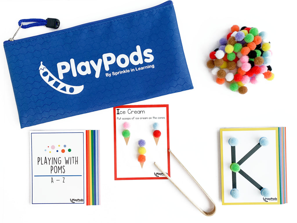 Blue PlayPod pouch, colorful poms, and activity cards
