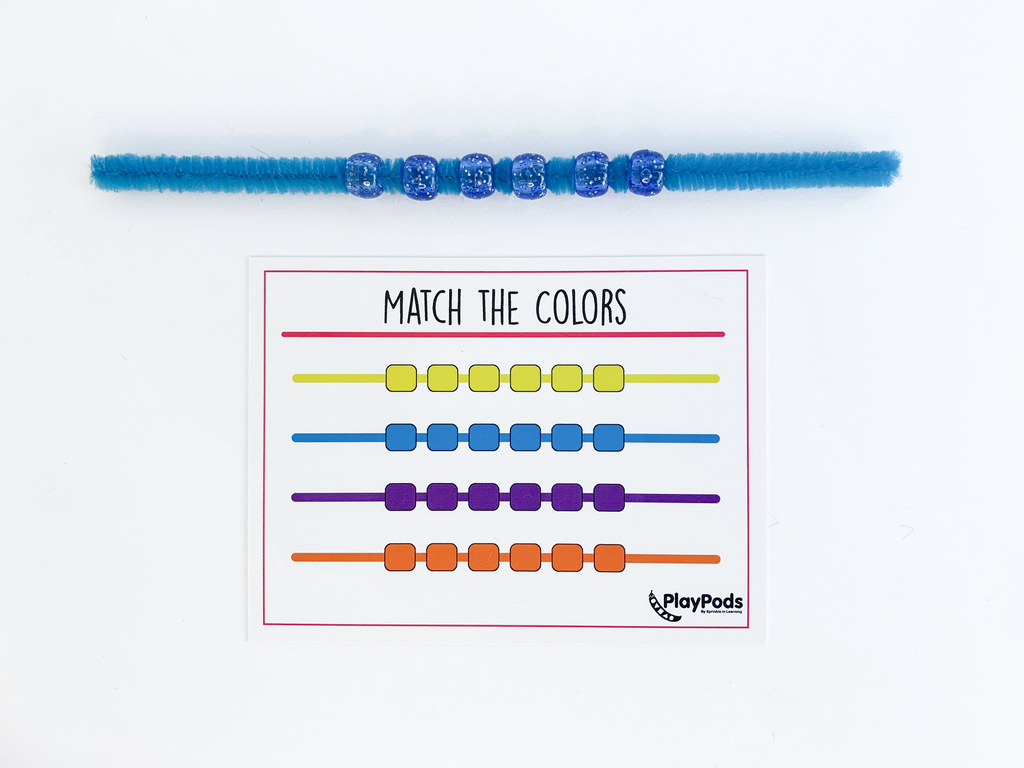 Blue sparkle beads on blue pipe cleaner. Match the color activity card. 