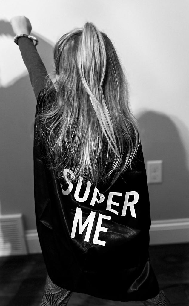 Girl with "super me" cape
