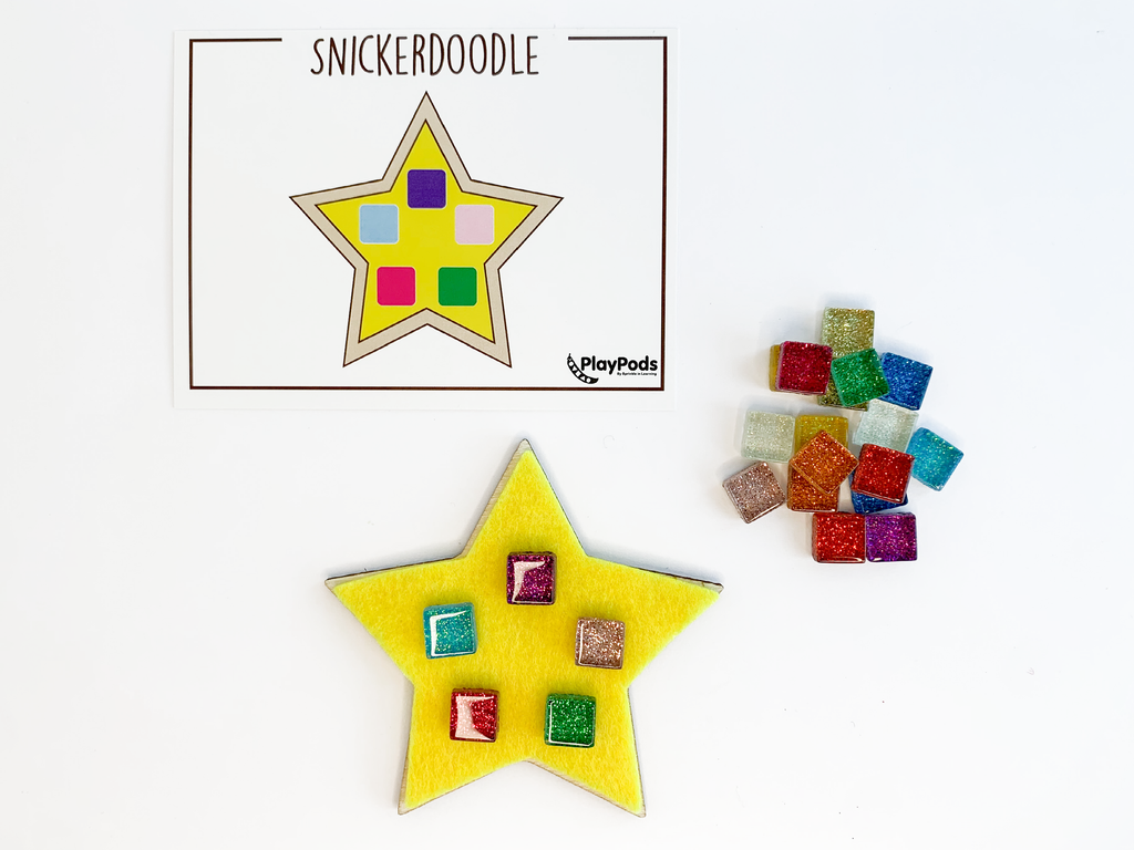 Instructions for a play snickerdoodle cookie. Colorful sprinkle tiles on a felt star.